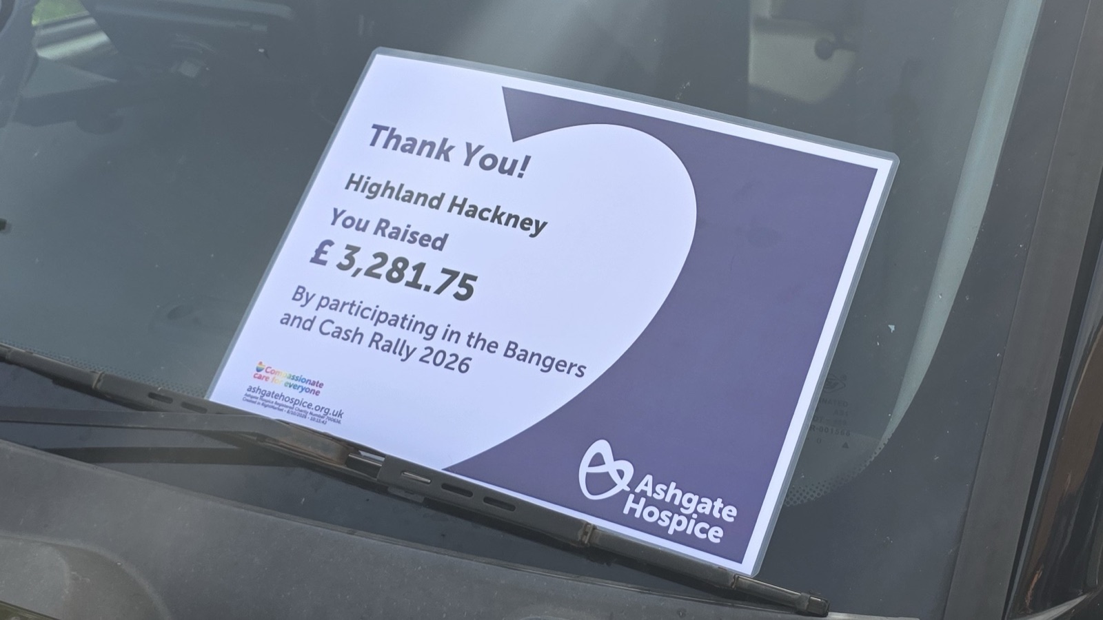 Ashgate Hospice’s thank-you for £3,281.75, in the windscreen of the cab