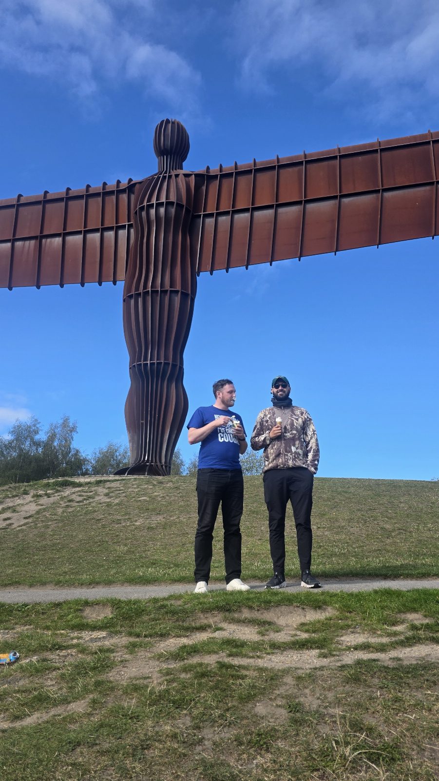 Take a team selfie at the Angel of the North