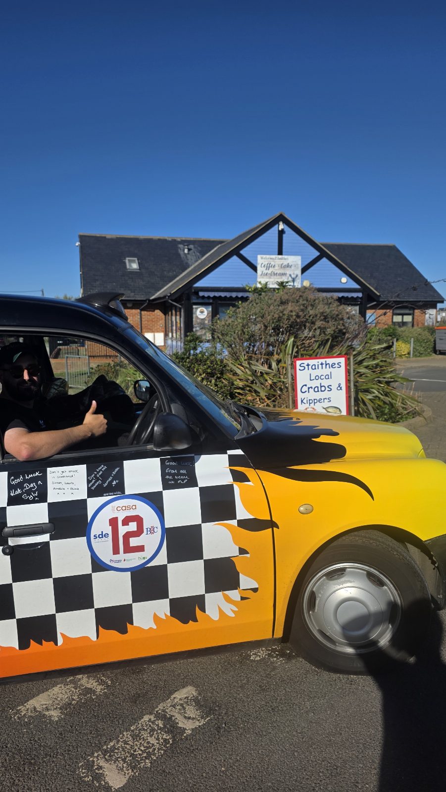 Take a team selfie at in the picture perfect Staithes.